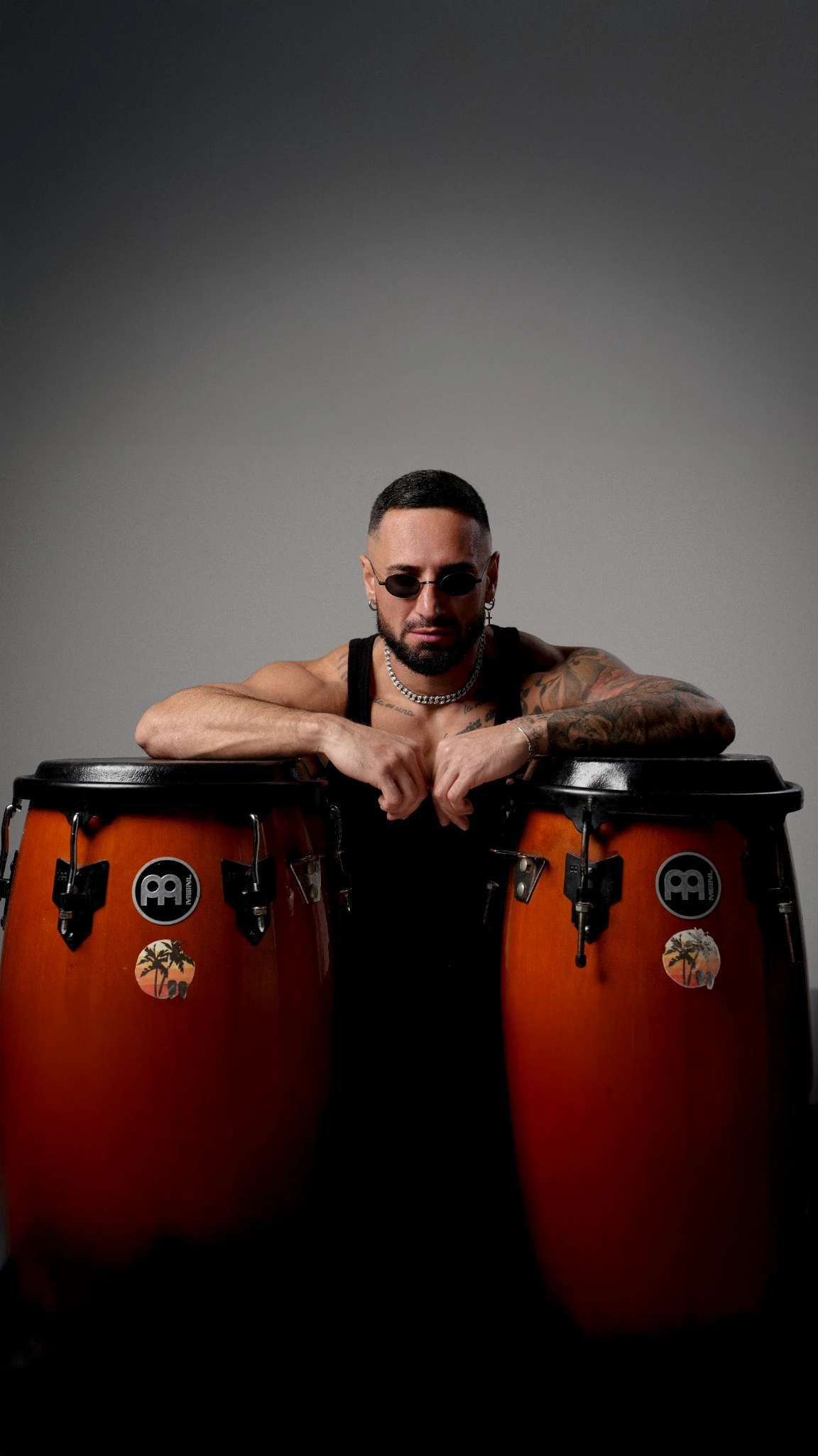 BokaConga Latin percussion artist posing with conga drums